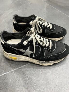 Golden Goose Black and White Running Sneakers with Star Detail